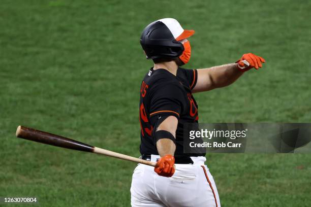 Chris Davis of the Baltimore Orioles swings at a pitch in the seventh inning against the Tampa Bay Rays at Oriole Park at Camden Yards on July 31,...