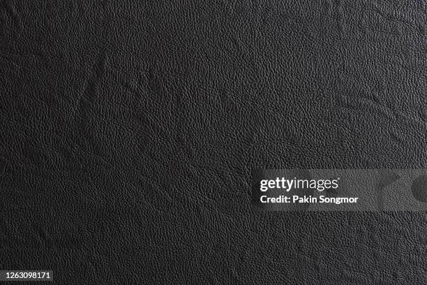 close up black leather and texture background. - grain texture stock pictures, royalty-free photos & images
