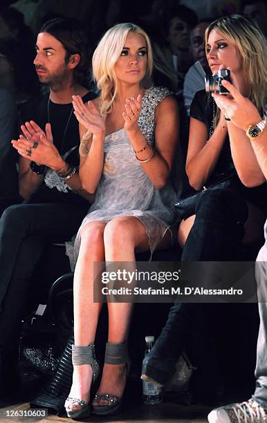 Actress Lindsay Lohan attends the Philipp Plein Urban Jungle Spring/Summer 2012 fashion show as part Milan Womenswear Fashion Week on September 24,...