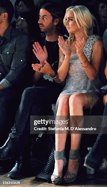 Actress Lindsay Lohan attends the Philipp Plein Urban Jungle Spring/Summer 2012 fashion show as part Milan Womenswear Fashion Week on September 24,...