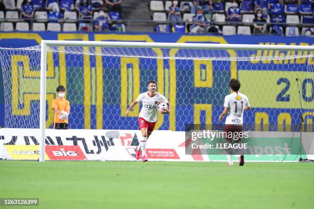 Stum of Kashima Antlers scores his side's first goal during the J.League Meiji Yasuda J1 match between Oita Trinita and Kashima Antlers at Showa...