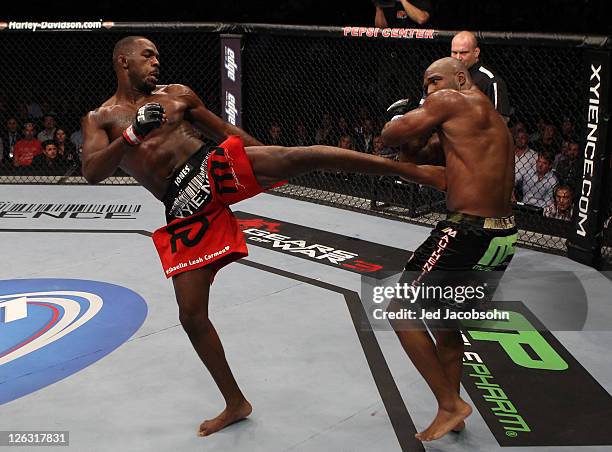 Jon Jones kicks Quinton "Rampage" Jackson during the UFC 135 event at the Pepsi Center on September 24, 2011 in Denver, Colorado.