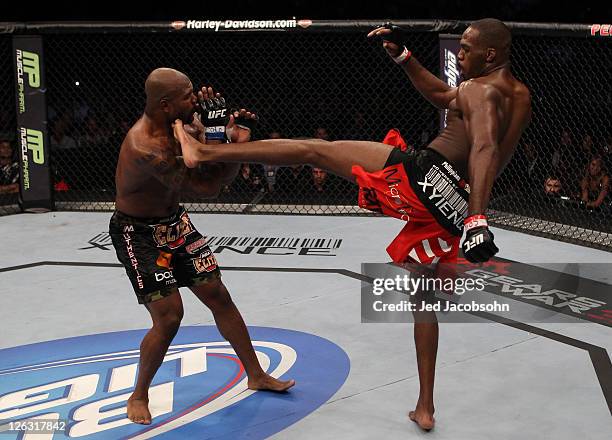 Jon Jones kicks Quinton "Rampage" Jackson during the UFC 135 event at the Pepsi Center on September 24, 2011 in Denver, Colorado.