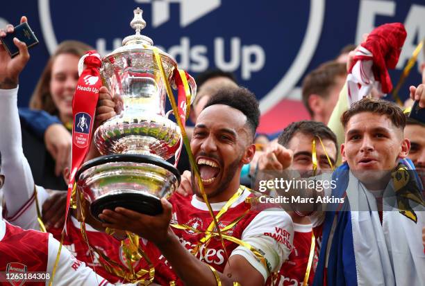 Arsenal captain Pierre-Emerick Aubameyang of Arsenal lifts the FA Cup Trophy following the FA Cup Final match between Arsenal and Chelsea at Wembley...