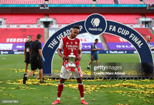 Pierre-Emerick Aubameyang of Arsenal celebrates with the Heads Up Emirates FA Cup Trophy following his team's victory in the FA Cup Final match...