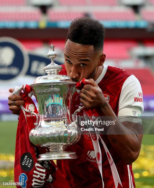 Pierre-Emerick Aubameyang of Arsenal kisses the FA Cup Trophy after his teams victory in the Heads Up FA Cup Final match between Arsenal and Chelsea...