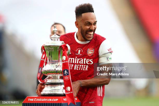 Pierre-Emerick Aubameyang of Arsenal celebrates with the Heads Up Emirates FA Cup Trophy following his team's victory in the FA Cup Final match...