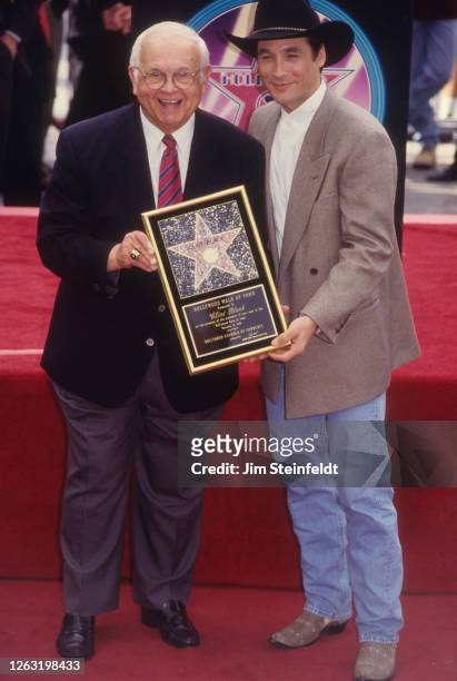 Clint Black receives Hollywood Walk-of-Fame Star at Hollywood Walk-of-Fame with Johnny Grant in Hollywood, California on July 27, 1996.