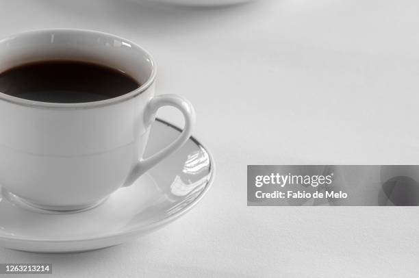 white cup coffee. - café bebida stock pictures, royalty-free photos & images