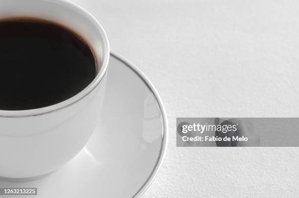 white cup coffee. - café bebida stock pictures, royalty-free photos & images