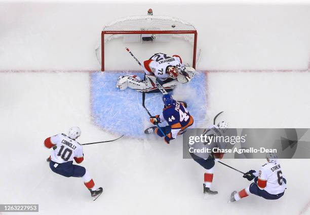 Jean-Gabriel Pageau of the New York Islanders scores against goaltender Sergei Bobrovsky of the Florida Panthers in the first period of Game One of...