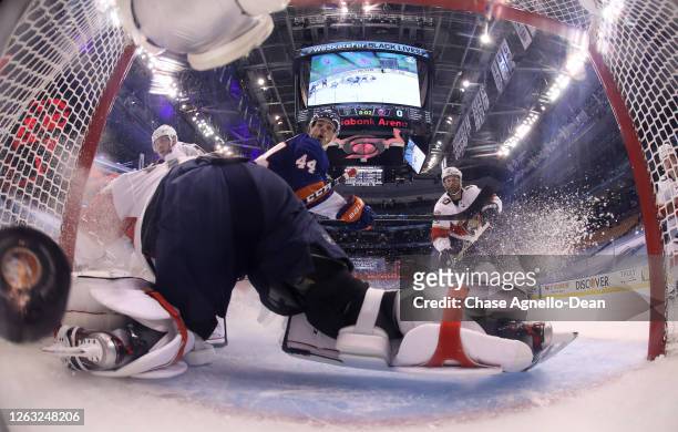 Jean-Gabriel Pageau of the New York Islanders scores against goaltender Sergei Bobrovsky of the Florida Panthers in the first period of Game One of...