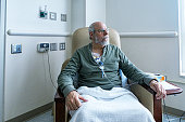 Senior Adult Man Cancer Outpatient During Chemotherapy IV Infusion