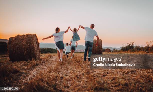 happy farmer family - working class mother stock pictures, royalty-free photos & images