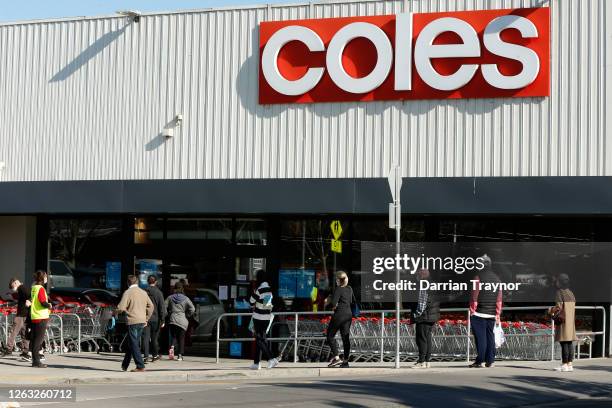 People line up outside a Coles supermarket in Malvern on August 02, 2020 in Melbourne, Australia. Public concern has increased as speculation grows...