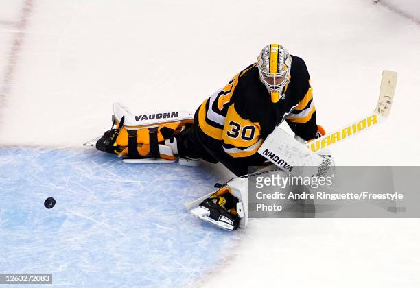 Matt Murray of the Pittsburgh Penguins is unable to stop a shot from Jeff Petry of the Montreal Canadiens to end Game One of the Eastern Conference...