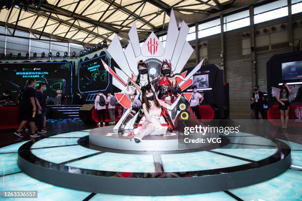 Cosplayers wearing masks perform during the 2020 China Digital Entertainment Expo & Conference at Shanghai New International Expo Center on August 1,...