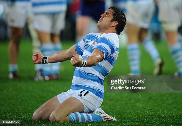Juan Manuel Leguizamon of Argentina celebrates his team's 13-12 victory as the final whistle blows during the IRB 2011 Rugby World Cup Pool B match...