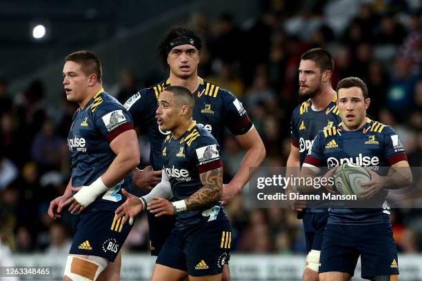 Ethan De Groot, Aaron Smith, Pari Pari Parkinson, Manaaki Selby-Rickit and Mitch Hunt of the Highlanders look on during the round 8 Super Rugby...