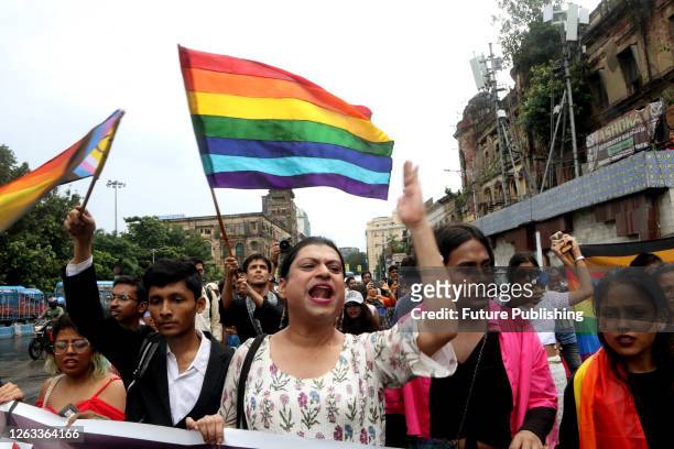 June 25 Kolkata, India: Members and supporters of LGBTQ community holld rainbow flag while taking part in the annual LGBTQ Pride Parade.