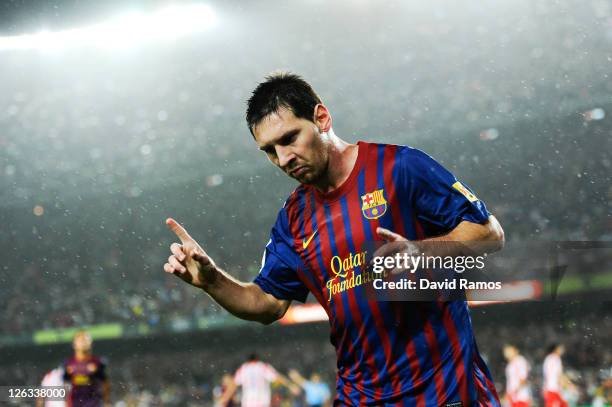 Lionel Messi of FC Barcelona celebrates after scoring his third team's goal during the La Liga match between FC Barcelona and Club Atletico de Madrid...