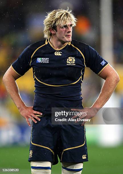 Dejected Richie Gray of Scotland looks on following his team's 13-12 defeat during the IRB 2011 Rugby World Cup Pool B match between Argentina and...