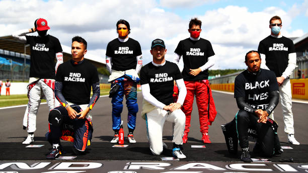 Drivers kneel on the grid in support of the Black Lives Matter movement before the F1 Grand Prix of Great Britain at Silverstone on August 02, 2020...