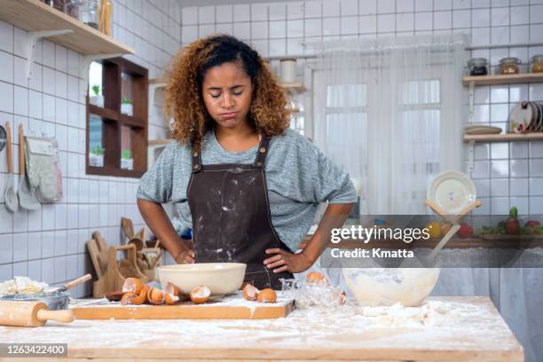 fail for preparing food - woman baking stock-fotos und bilder