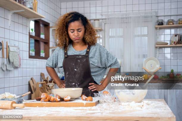 fail for preparing food - angry black woman stock pictures, royalty-free photos & images