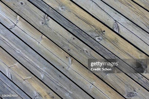 boards on a wooden deck outdoors - jetty stock pictures, royalty-free photos & images