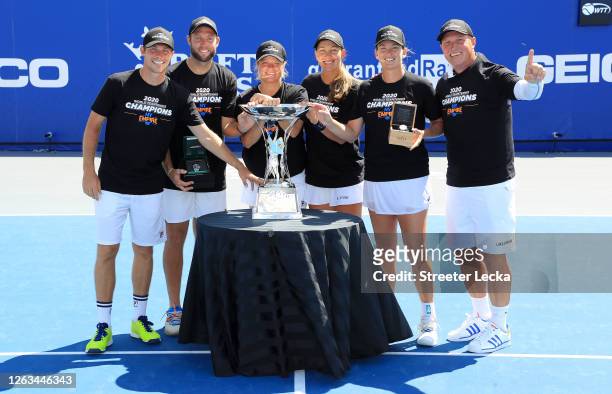Neal Skupski, Jack Sock, Kim Clijsters, Nicole Melichar, Coco Vandeweghe and Coach Luke Jensen of the New York Empire celebrate with the trophy after...