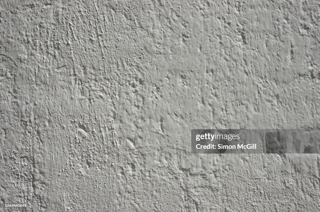 Whitewashed stucco wall