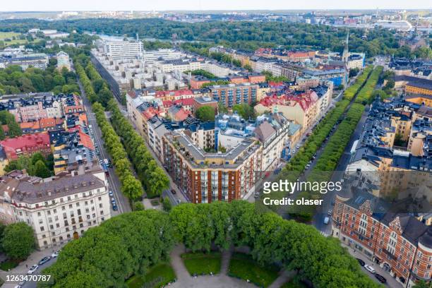 karlaplan, central stockholm, apartment buildings, karlavägen - aerial park stock pictures, royalty-free photos & images