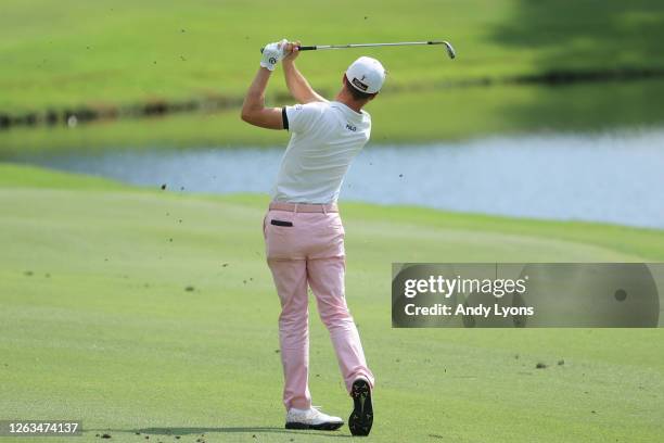 Justin Thomas of the United States plays a shot on the 12th hole during the final round of the World Golf Championship-FedEx St Jude Invitational at...