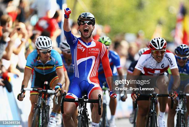 Mark Cavendish of Great Britain celebrates after winning the Men's Elite Road Race during day seven of the UCI Road World Championships on September...