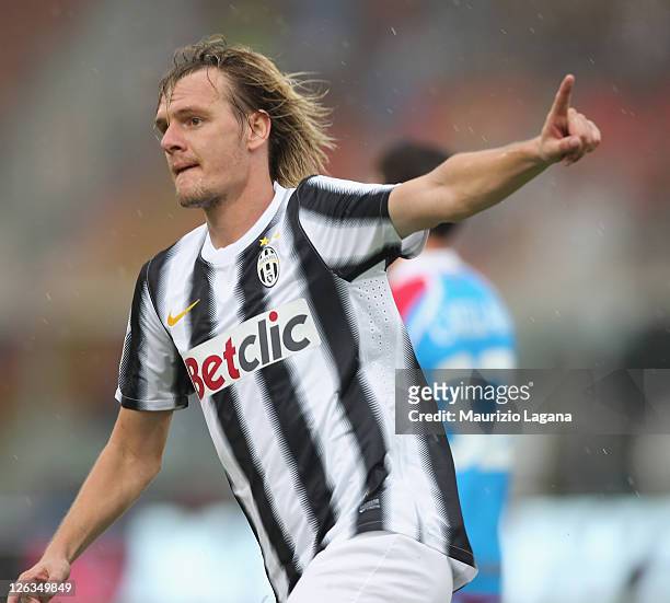 Milos Krasic of Juventus celebrates after scoring their first goal during the Serie A match between Catania Calcio and Juventus FC at Stadio Angelo...