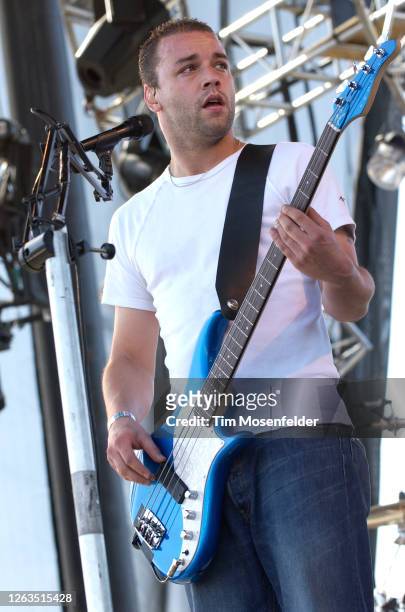 Chris Wolstenholme of Muse performs during Coachella 2004 at the Empire Polo Fields on May 2, 2004 in Indio, California.