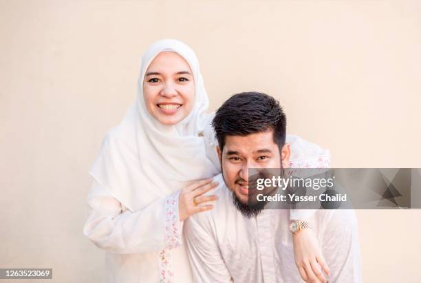 muslim couple studio shot - malay couple stock pictures, royalty-free photos & images