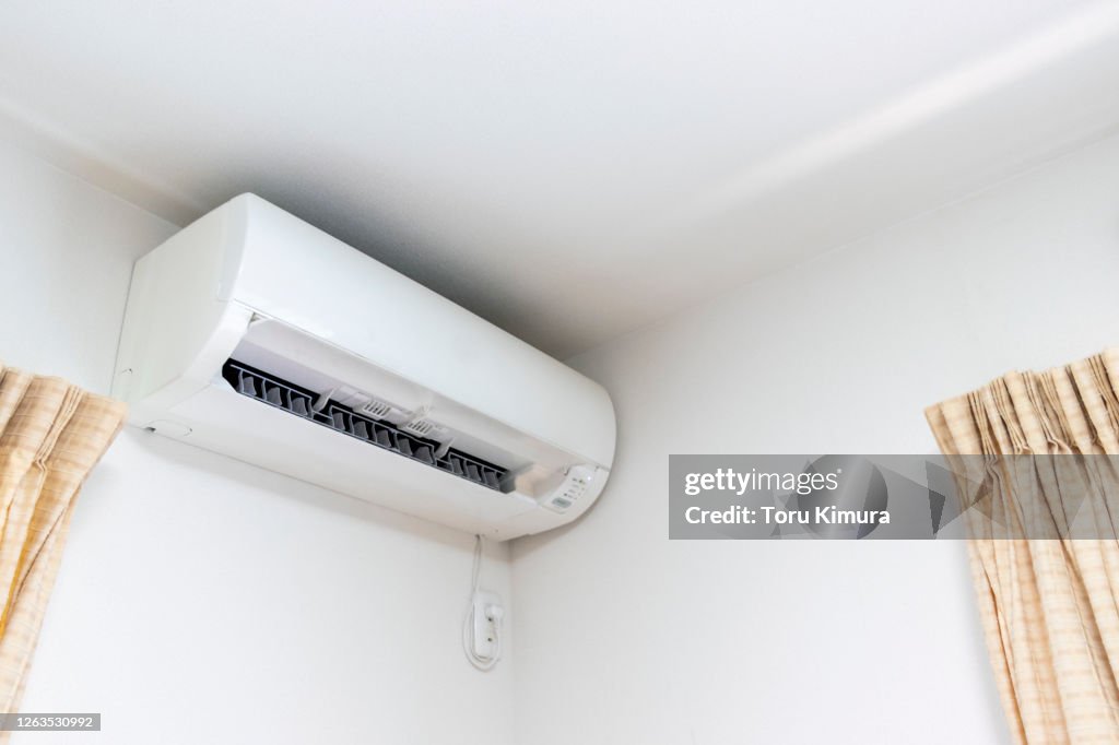 White air conditioner in the bright room