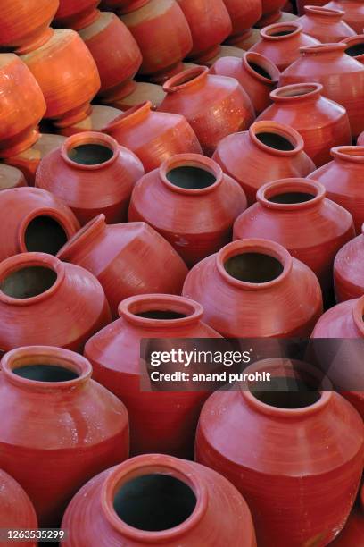 earthen pots, the organic way - tongeschirr stock-fotos und bilder