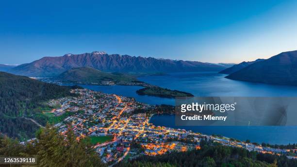 queenstown at night twilight panorama new zealand - otago stock pictures, royalty-free photos & images