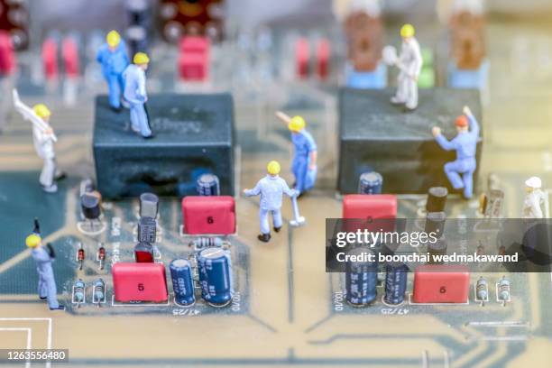miniature electronic technician  /  soft focus - miniature painting stock pictures, royalty-free photos & images