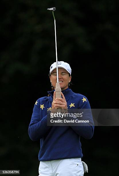 Sophie Gustafson of Europe reacts to a missed putt on the 15th green during the singles matches on day three of the 2011 Solheim Cup at Killeen...