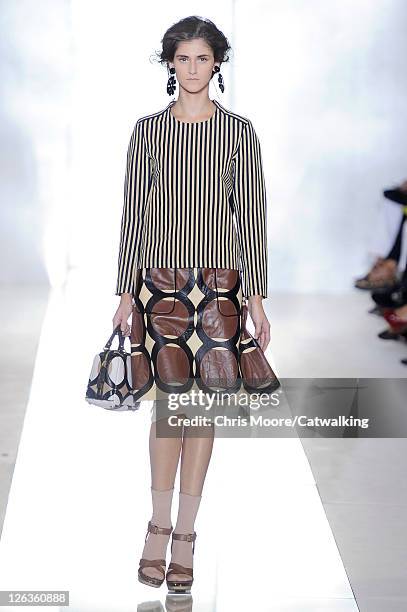 Model walks the runway at the Marni Spring Summer 2012 fashion show during Milan Fashion Week on September 25, 2011 in Milan, Italy.