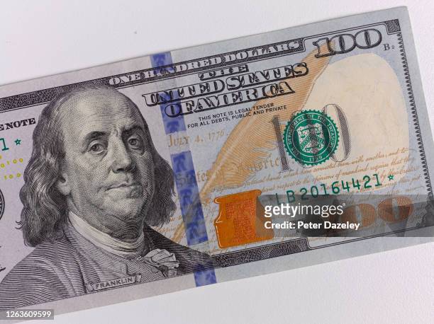 In this photo illustration, a close up of a US 100 Dollar Bill featuring Benjamin Franklin photographed on August 3,2020 in London,England.