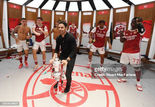 Arsenal Head Coach Mikel Arteta celebrates with Hector Bellerin, Kieran Tierney, Lucas TOrreira, Reiss Nelson and Bukayo Saka after the FA Cup Final...