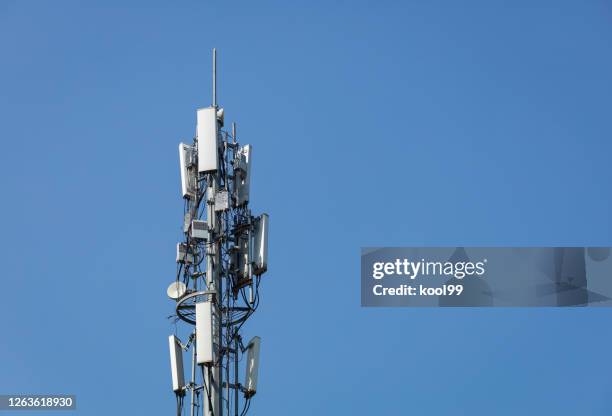5g telecommunications base station tower - antenna stock pictures, royalty-free photos & images