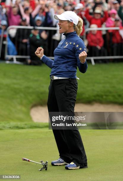 Suzann Pettersen of Europe celebrates on the 18th green during the singles matches on day three of the 2011 Solheim Cup at Killeen Castle Golf Club...