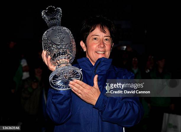 Europe Captain Alison Nicholas celebrates her team's 15-13 victory with the trophy following the singles matches on day three of the 2011 Solheim Cup...