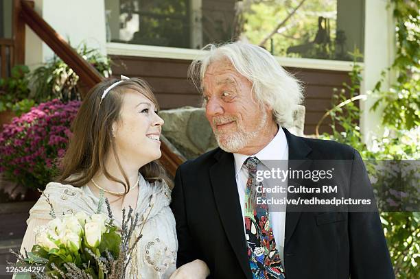 bride walking with father - ojai california photos et images de collection